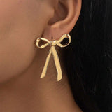 Daisy Gold Bow Studs - Pure Apotheca