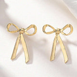 Daisy Gold Bow Studs - Pure Apotheca