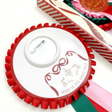 Nice List Member Christmas Rosette Badge Pink/Red - Pure Apotheca