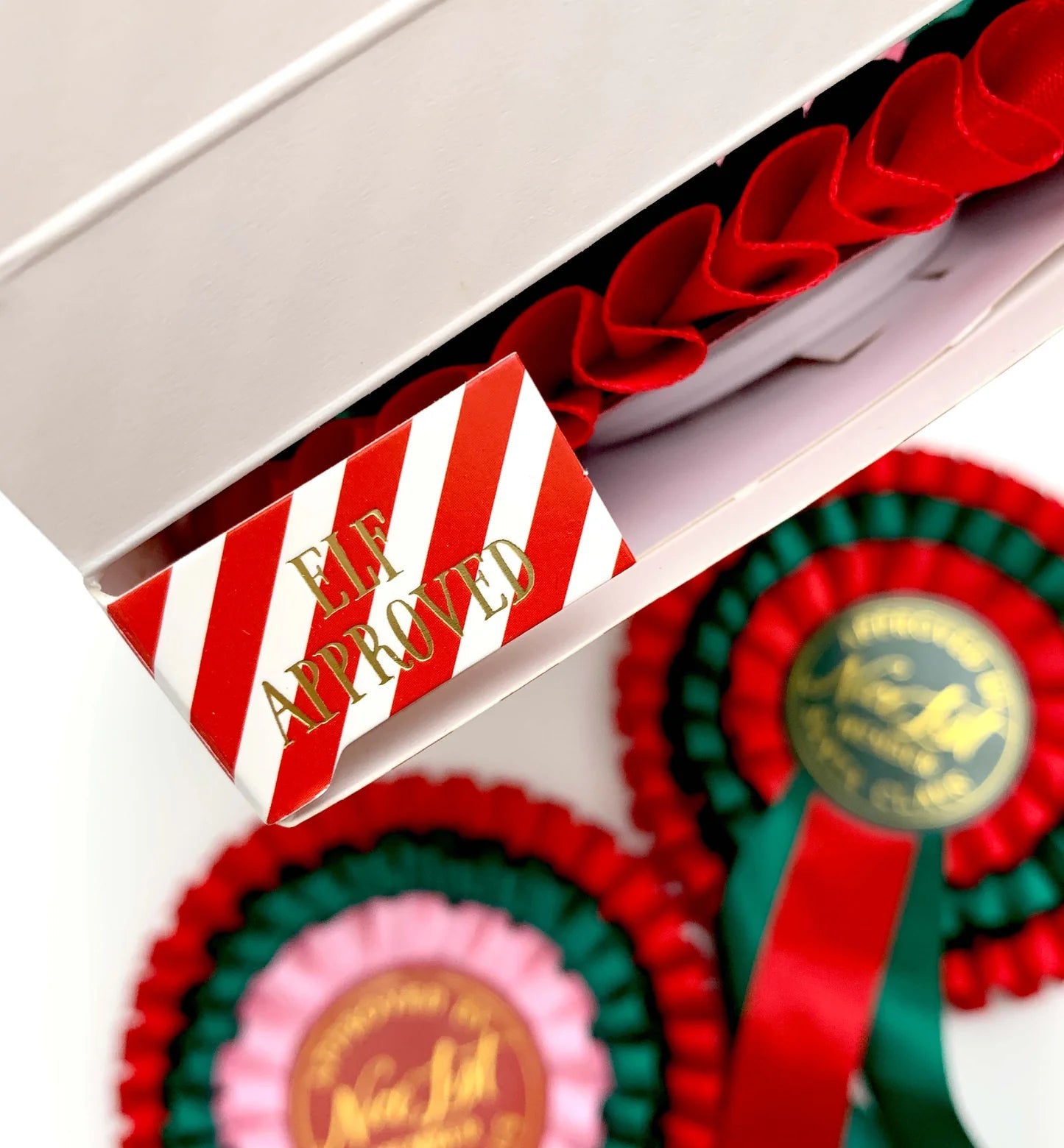 Nice List Member Christmas Rosette Badge Pink/Red - Pure Apotheca