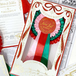 Nice List Member Christmas Rosette Badge Pink/Red - Pure Apotheca