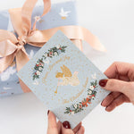 Peace Love & Joy Herald Angel Christmas Card - Pure Apotheca